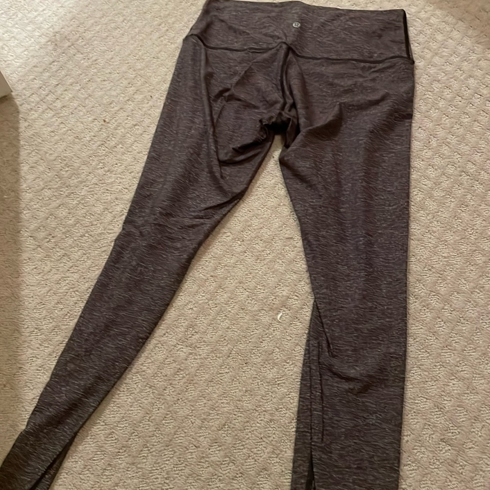 Gray lululemon leggings with dark seam.